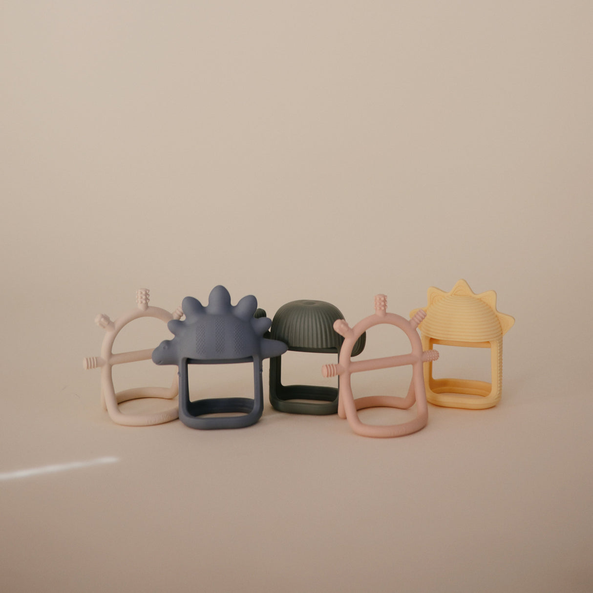 No-Drop Dino Teether (Tradewinds) - HoneyBug