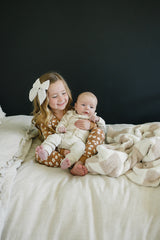 Cream Bamboo Snap Long Sleeve Ribbed Bodysuit - HoneyBug 